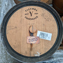 Wooden barrel with 'Yalumba' branding and a 'BeerCo' label on a concrete surface.