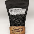 Black packaging of East Kent Goldings hop pellets with a BeerCo branded label on a white background.