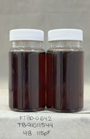 Two glass jars with white lids containing Dark Agave Syrup