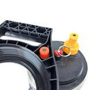 Close-up of a black plastic component with red and yellow connectors on a white background