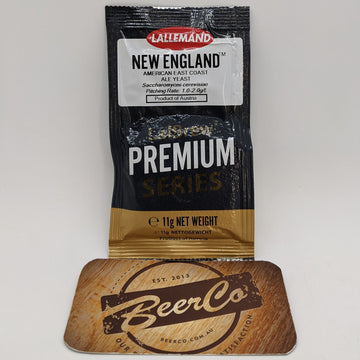 A package of Lallemand Brewing New England American East Coast Ale Yeast with a blurred background.