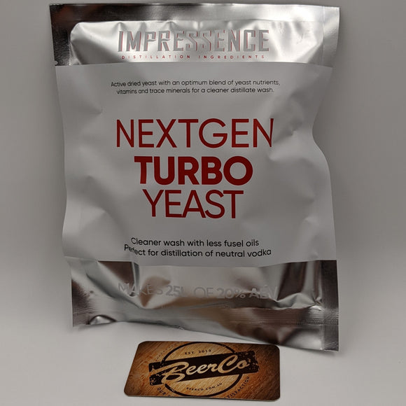 A silver foil pouch labeled 'IMPRESSENCE Nextgen Turbo Yeast' stands upright on a light gray surface, with a smaller brown rectangular card or label in front that reads 'BeerCo'.