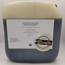 Large container of organic blue agave syrup with 'BeerCo' label on a white background