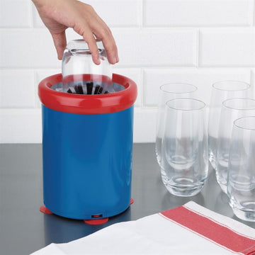 Blue and red trash can with a hand disposing of a glass, surrounded by empty glasses on a kitchen counter.