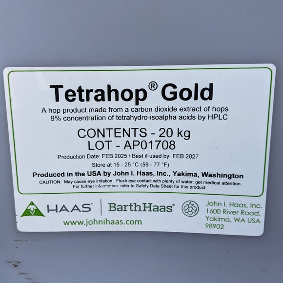 Tetrahop Gold container with label on a gray background