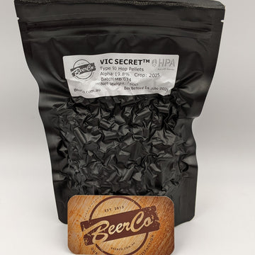 Black bag of Vic Secret hop pellets with a BeerCo branded card on a white background