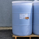 A large plastic drum labeled with the 'Best Ground' brand, containing organic raw 100% blue agave syrup.