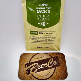 Packaging of Mangrove Jack's M02 Craft Series Dried Yeast for cider making, displayed on a wooden surface.